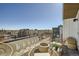 Relaxing balcony with stylish seating and a cozy fire pit perfect for enjoying the city view at 1301 Osceola St, Denver, CO 80204