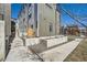 Modern townhome with a sleek exterior, landscaped grounds, and convenient sidewalk access enhancing curb appeal at 1301 Osceola St, Denver, CO 80204