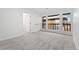 A bright, carpeted bedroom features big windows, double closets, and white walls offering ample storage and natural light at 1347 S Crystal Way, Aurora, CO 80012