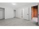 Bright bedroom with neutral carpet features closet and ensuite access at 1347 S Crystal Way, Aurora, CO 80012