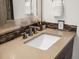 Close-up of a sleek bathroom vanity with modern fixtures and stylish decor at 3640 Lipan St, Denver, CO 80211