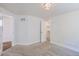 Bright bedroom featuring neutral carpeting, white walls, trim, and modern recessed lighting at 3640 Lipan St, Denver, CO 80211