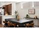Chic dining area next to the kitchen, featuring a modern table setting and plenty of natural light, ideal for hosting at 3640 Lipan St, Denver, CO 80211