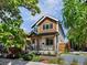 Charming two-story home with landscaped front yard and inviting porch at 3640 Lipan St, Denver, CO 80211
