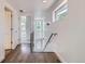 Hallway with hardwood floors, lots of natural light, and white walls at 3640 Lipan St, Denver, CO 80211