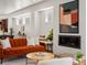 Inviting living room with fireplace, stylish furniture, and ample natural light offers a comfortable and elegant space at 3640 Lipan St, Denver, CO 80211