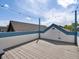 Rooftop deck featuring blue trim and white siding, with a view of the neighborhood at 3640 Lipan St, Denver, CO 80211