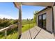 Spacious back deck featuring metal railing with stunning views at 15132 Pecos St, Broomfield, CO 80023