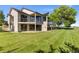 Beautiful backyard showcasing a spacious deck with modern railings and well-maintained lawn at 15132 Pecos St, Broomfield, CO 80023