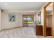 Bedroom with a sliding glass door to the outside and dresser with a mirror at 15132 Pecos St, Broomfield, CO 80023