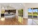 Open concept kitchen with a breakfast bar, stylish stools, and a view from large sliding doors at 15132 Pecos St, Broomfield, CO 80023