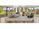 Elegant living room with hardwood floors, stylish furnishings, and a bright airy feel at 15132 Pecos St, Broomfield, CO 80023