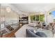 Bright and airy living room with modern decor, large windows, and an open floor plan at 15132 Pecos St, Broomfield, CO 80023