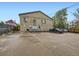 Spacious parking lot area, ensuring ample parking for residents and visitors at 2460 W Caithness Pl # 105, Denver, CO 80211