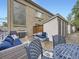 Inviting patio area with comfortable seating, ideal for outdoor entertaining and enjoying the weather at 2460 W Caithness Pl # 105, Denver, CO 80211