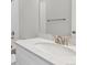 Bright bathroom featuring a white sink and countertop, complemented by brushed nickel fixtures and a clean, modern aesthetic at 453 Interlocken Blvd # 101, Broomfield, CO 80021
