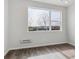 Bright bedroom with hardwood floors and a large window offering lots of natural light at 453 Interlocken Blvd # 101, Broomfield, CO 80021