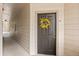 Inviting entryway with decorated front door and walkway at 7212 S Blackhawk St # 1-103, Englewood, CO 80112
