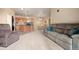 Open concept living space with carpet, kitchen, and eating area at 7212 S Blackhawk St # 1-103, Englewood, CO 80112