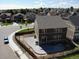 Aerial view of a two-story home with a fenced backyard and concrete patio at 15955 E Otero Cir, Centennial, CO 80112