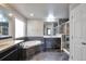 Luxurious bathroom featuring a soaking tub, a shower and double sink vanity at 15955 E Otero Cir, Centennial, CO 80112