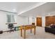 Finished basement area, great for games and entertainment at 1206 E Phillips Pl, Littleton, CO 80122
