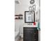 Stylish powder room features dark vanity, pendant lighting, and modern fixtures at 1206 E Phillips Pl, Littleton, CO 80122
