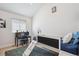 This room features whimsical decor, a sleeping/play structure, and natural light at 1206 E Phillips Pl, Littleton, CO 80122