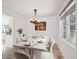 Dining room with modern lighting, dining table with seating for six at 1206 E Phillips Pl, Littleton, CO 80122