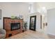 Spacious bedroom featuring brick fireplace and adjacent hall at 1206 E Phillips Pl, Littleton, CO 80122