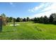 Grassy green area with trees in a well maintained common space at 9808 E Carolina Pl, Aurora, CO 80247