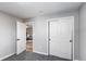 Bedroom with gray carpet and closet doors at 116 S 10Th Ave, Brighton, CO 80601