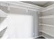 Walk-in closet with ample shelving for organization and storage at 116 S 10Th Ave, Brighton, CO 80601