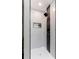 Walk-in shower with sleek fixtures, built-in niche and tiled walls at 116 S 10Th Ave, Brighton, CO 80601