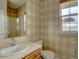 Bathroom with single sink vanity and a window at 5072 Meadow Mountain Dr, Broomfield, CO 80023