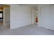 Bright bedroom features neutral carpet, closet, and a door with access to other parts of the home at 5072 Meadow Mountain Dr, Broomfield, CO 80023