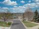 Scenic view of the community park with picnic area and walking paths on a sunny day at 5072 Meadow Mountain Dr, Broomfield, CO 80023
