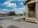 Charming home with a welcoming porch and white picket fence enhancing the curb appeal at 5072 Meadow Mountain Dr, Broomfield, CO 80023