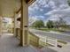 Inviting front porch with cozy railings and views of the surrounding neighborhood at 5072 Meadow Mountain Dr, Broomfield, CO 80023