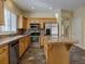 Modern kitchen with stainless steel appliances, granite counters, and ample cabinet space at 5072 Meadow Mountain Dr, Broomfield, CO 80023
