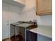Practical laundry room area with modern washer and dryer units at 5072 Meadow Mountain Dr, Broomfield, CO 80023