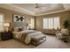 Spacious primary bedroom boasts natural light, shutters, and a calming ambiance for restful nights at 5072 Meadow Mountain Dr, Broomfield, CO 80023