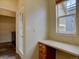 Small office space with built-in desk and a window at 5072 Meadow Mountain Dr, Broomfield, CO 80023