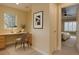Bright home office with desk space and view into the bedroom, creating a versatile living space at 5072 Meadow Mountain Dr, Broomfield, CO 80023