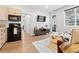 Modern living room featuring hardwood floors and a mountain view at 2152 Bighorn Rd # 203, Georgetown, CO 80444