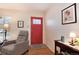 Inviting foyer with a red front door and tasteful decor at 2993 S Zenobia St, Denver, CO 80236