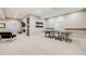Finished basement with ping pong table, fireplace, and recreational space at 10590 Soulmark Way, Highlands Ranch, CO 80126