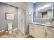 Bathroom showcasing a modern vanity, walk-in shower, and neutral tones at 10590 Soulmark Way, Highlands Ranch, CO 80126