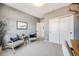 Comfortable home office featuring modern seating, a large closet, and lots of natural light at 10590 Soulmark Way, Highlands Ranch, CO 80126