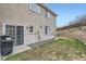 Backyard features a grassy yard, small patio area, and a partial fence, with a grill at 2139 Coronado Pkwy # B, Denver, CO 80229